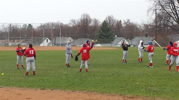 Die hards! Getting ready for a game on a rainy day. Brrr!
