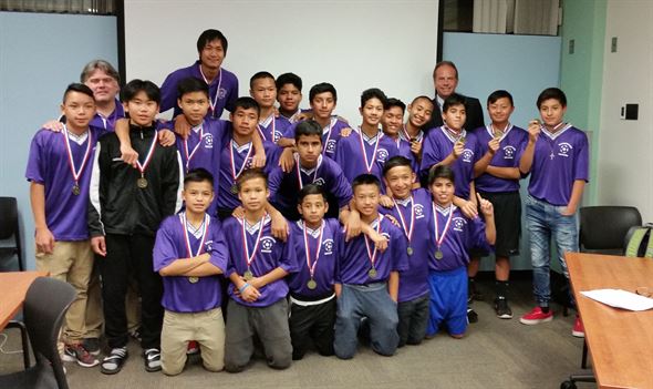 2015 MS Soccer team with Coach Htee Khu Htoo, Assistant Aaron Crawford and Dr. McCollor