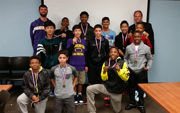 2015 Flag Football team with Coach Jon Schuh and Dr. McCollor.